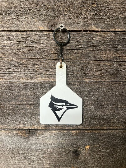 School Swag cattle tag keychains, Guthrie Bluejays, Edmond North Huskies